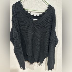 Distressed knit sweater